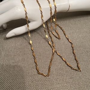 Gold tone hammered link necklace.  Great for layering.